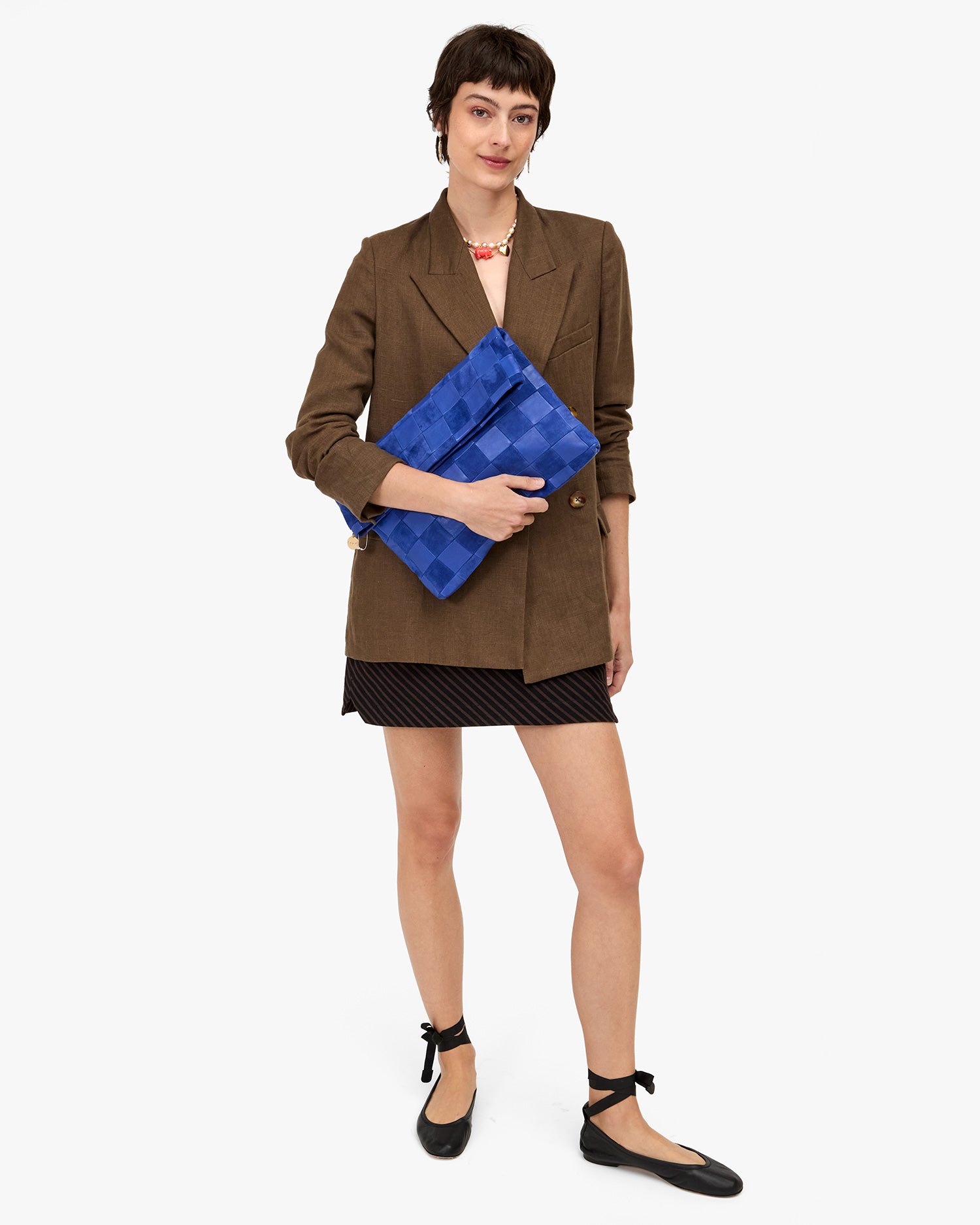 Nike holding Carryall Clutch full view