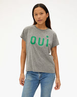 Maly wearing the Classic Tee in Grey Oui with jeans