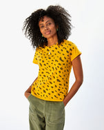 Mecca wearing the Marigold Jaguar Classic Tee