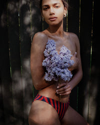 Dip Bottom on model holding flowers