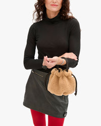 Emma w Top Handle on Danica's wrist