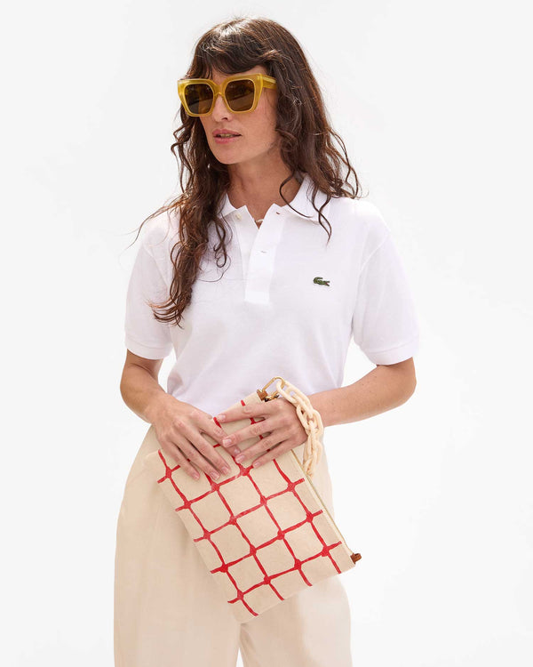 Flat Clutch w/ Tabs in Danica's hands