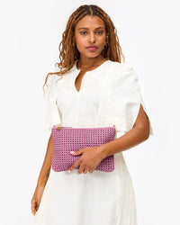 Bree holding Flat Clutch w/ Tabs