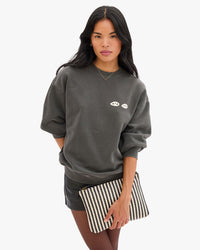 Sandra holding Flat Clutch w Tabs