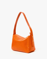 Back view of the Zucca (orange) Fleurine.