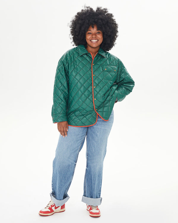 Candice wearing the Spruce & Poppy Quilted Nylon Jacque Jacket with jeans and nikes