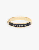 Le Bangle Bracelet showing one side of the bracelet that reads "MASCULIN". 
