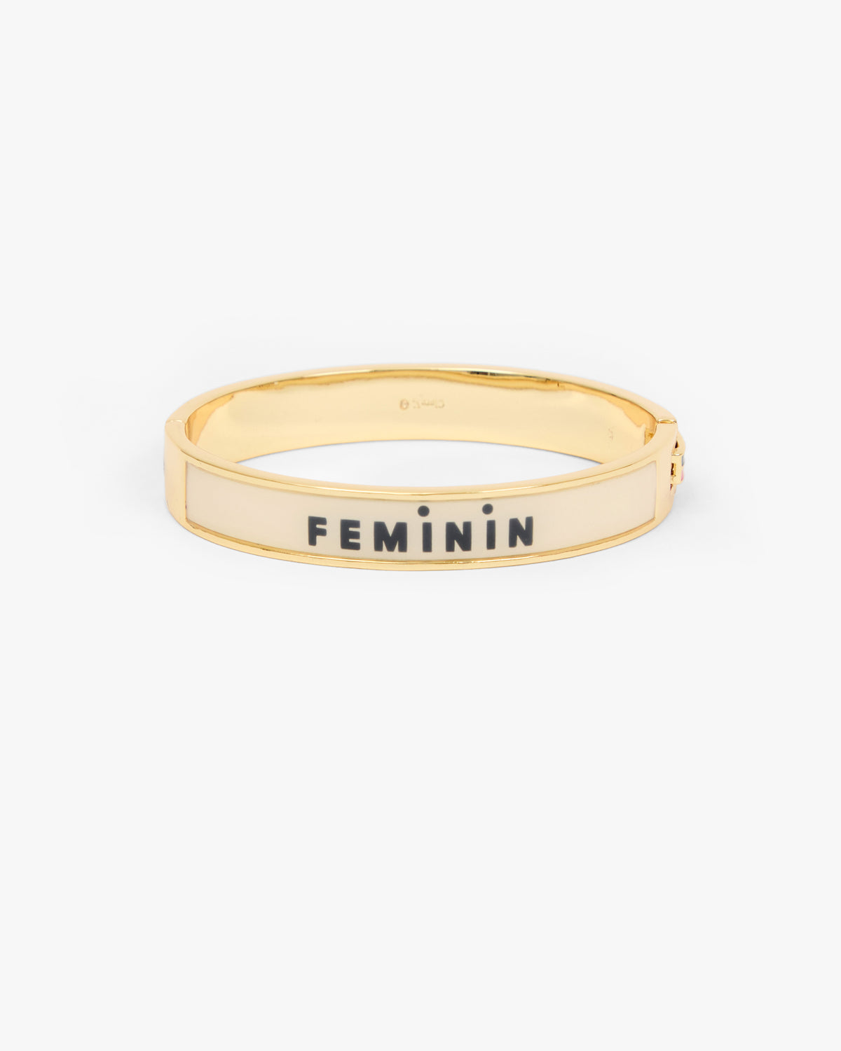 Le Bangle Bracelet showing the other side of the bracelet that reads "FEMININ". 