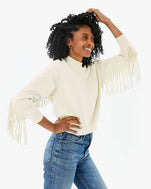 Mecca wearing the Cream Le Drop Fringe with jeans