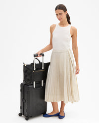 Le Zip Sac w Pocket on suitcase