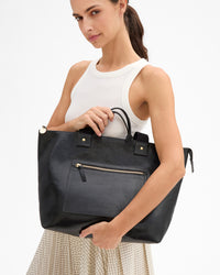 Marie holding Le Zip Sac w Pocket