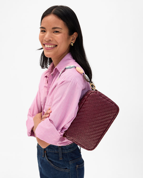 Model wears Shortie Strap on Marisol on her shoulder