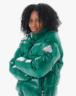 Mecca wearing the Vintage Mythic Puffer Coat in Forest Biome