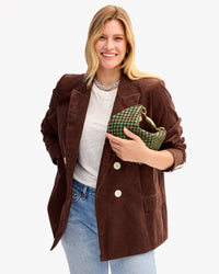 Elle holding Top Handle Bebe