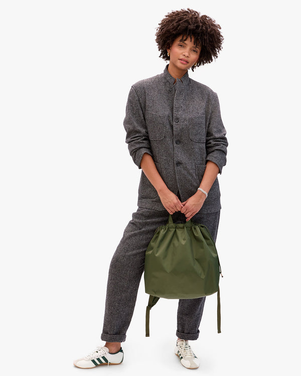 Lenny holding Sac Tout Backpack