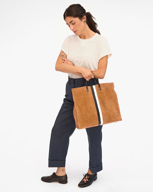 Gia holding top handle of Simple Tote