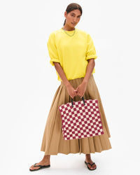 Lizzy holding Summer Simple Tote top handle