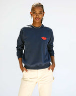 Jordan wears our Bisous Sweatshirt in Navy