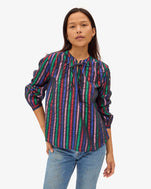 Maly wearing the Multi Stripe Thea Blouse with jeans