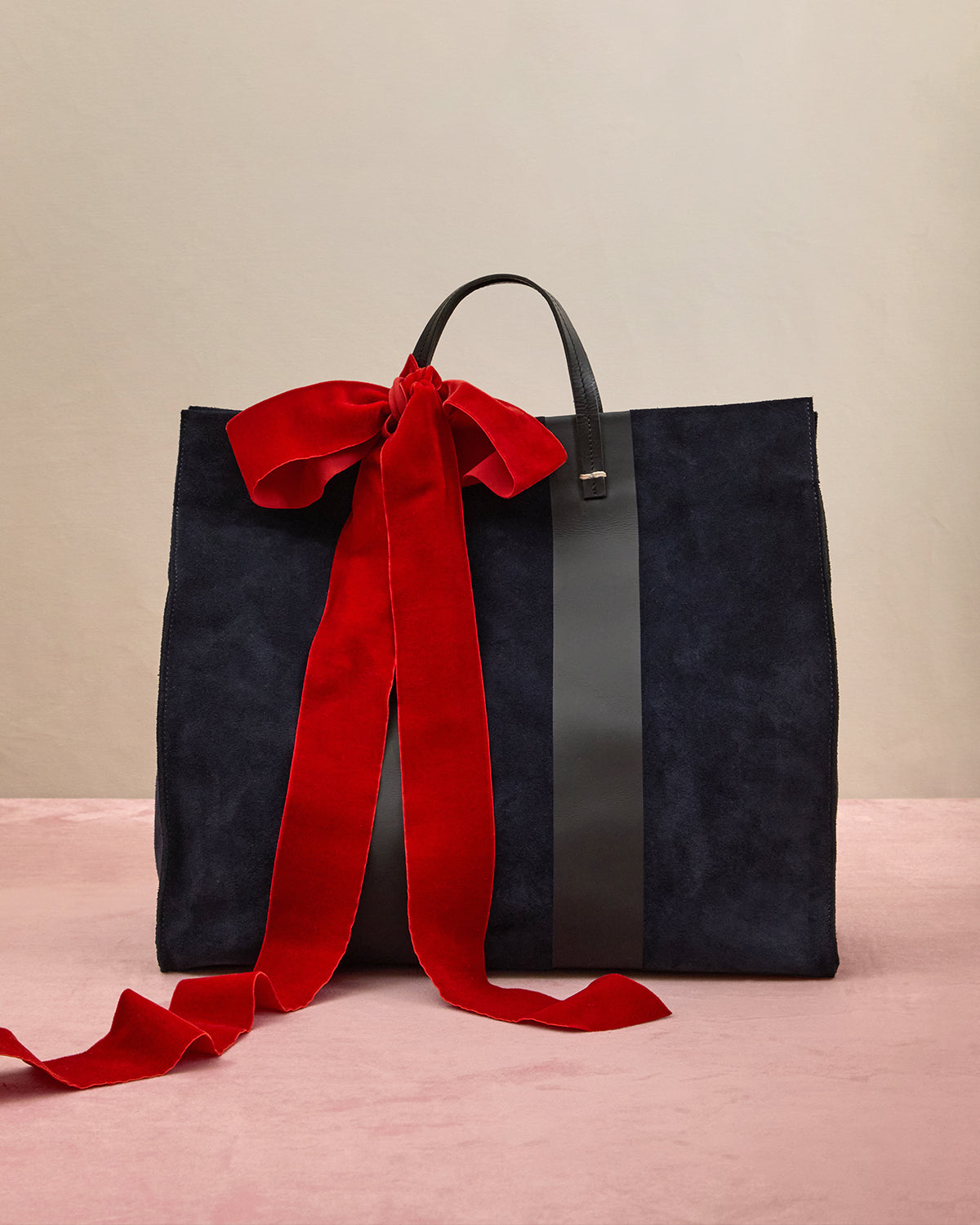 Navy Suede with Racing Stripes Simple Tote with bow on it. 