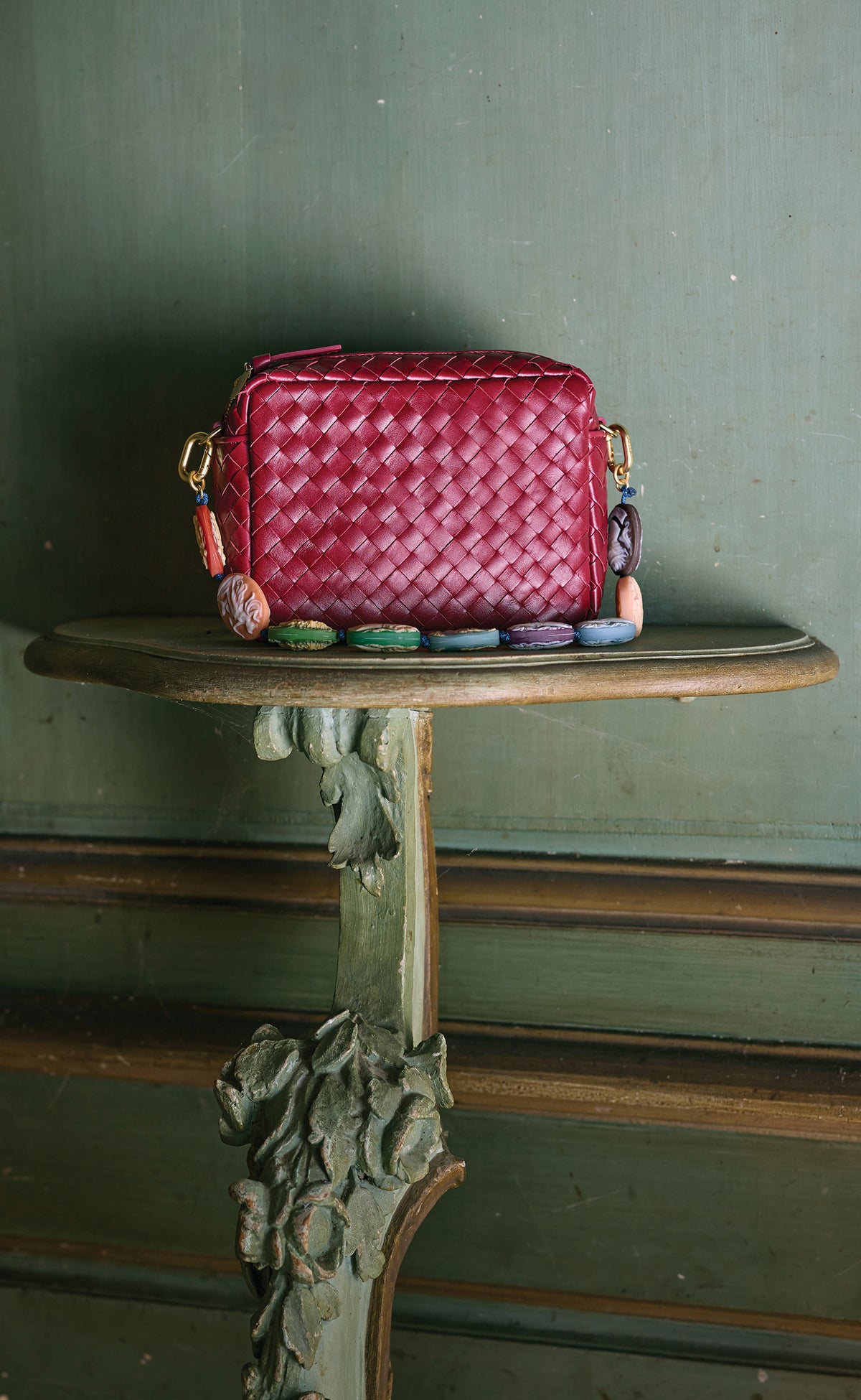 Garnet Diagonal Woven Midi Sac with Pocket with Multi Cameo Shortie Strap attached to it. 