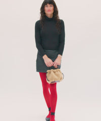 Model carrying the Café Au Lait Emma with Top Handle.