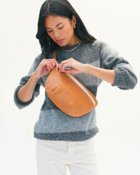 Model carrying the Cuoio Perf Grande Fanny.