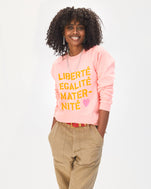 mecca wearing the rose every mother counts sweatshirt with khaki pants