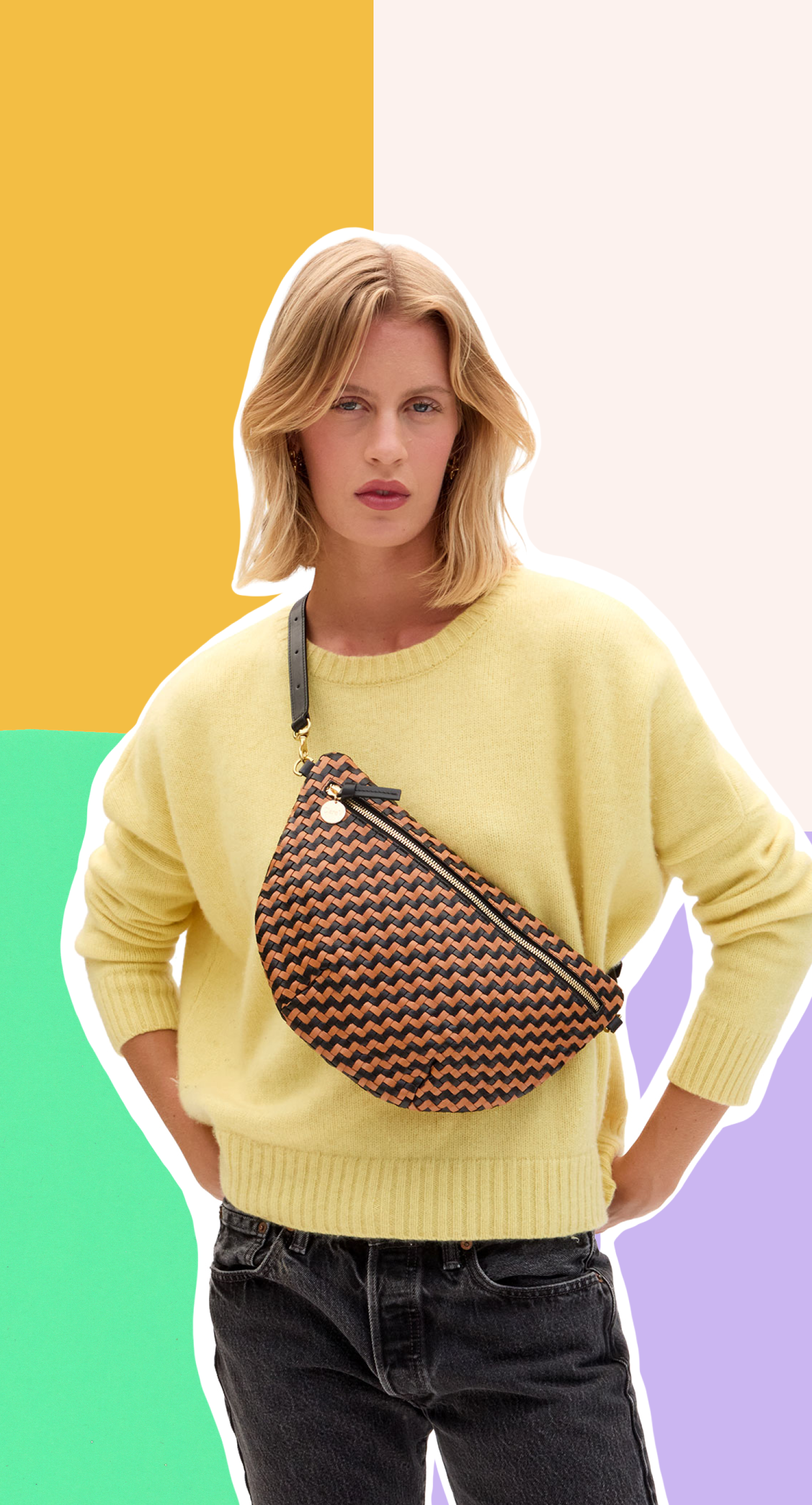 Model carrying the Black and Natural Woven Zig Zag Grande Fanny across her chest. 