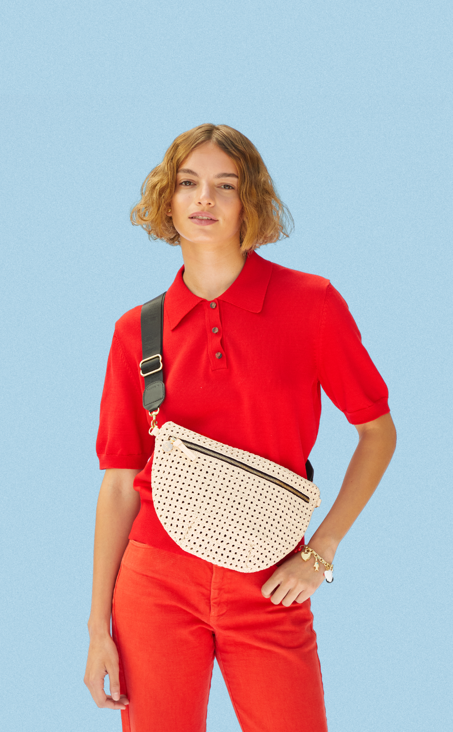 Model wearing the Cream Rattan Grande Fanny w/ Adjustable Webbing Strap.