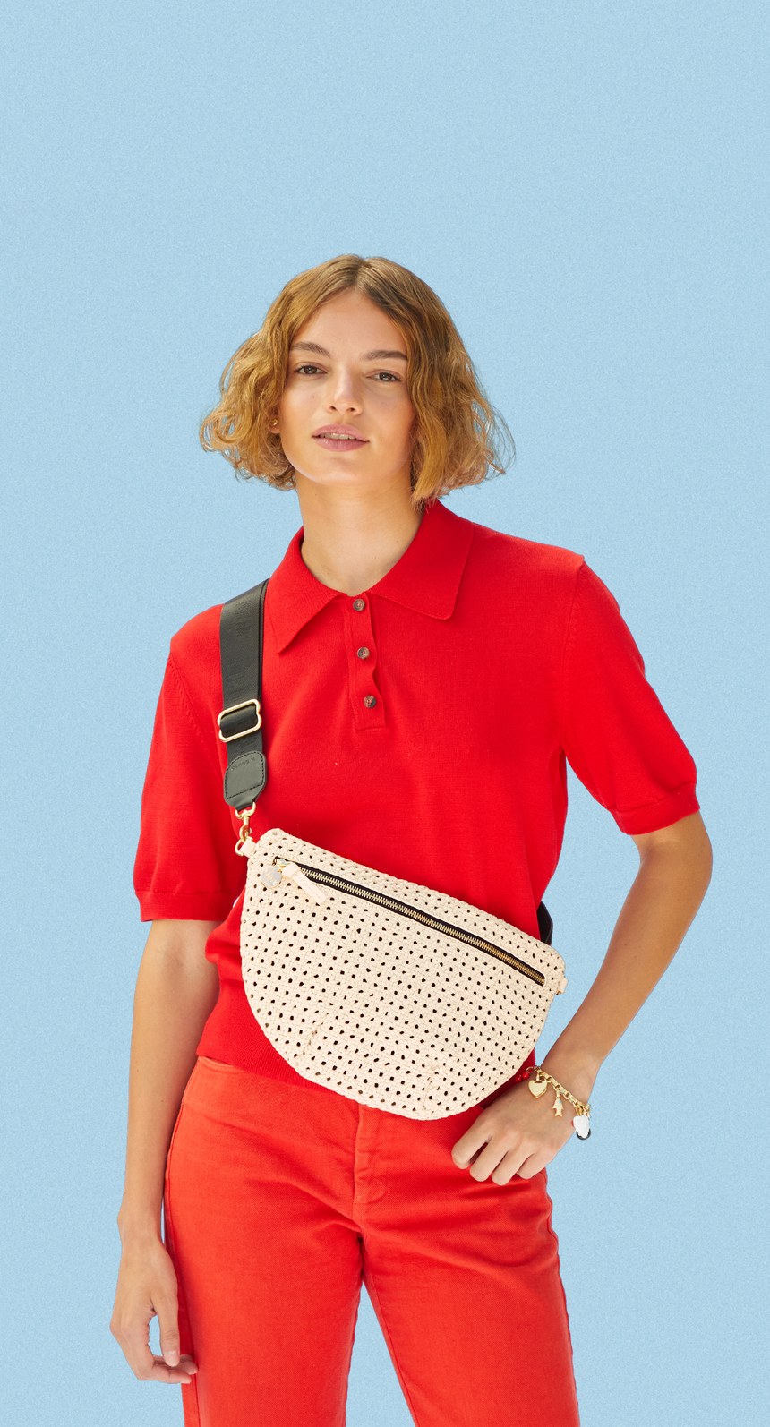 Model wearing the Cream Rattan Grande Fanny w/ Adjustable Webbing Strap.