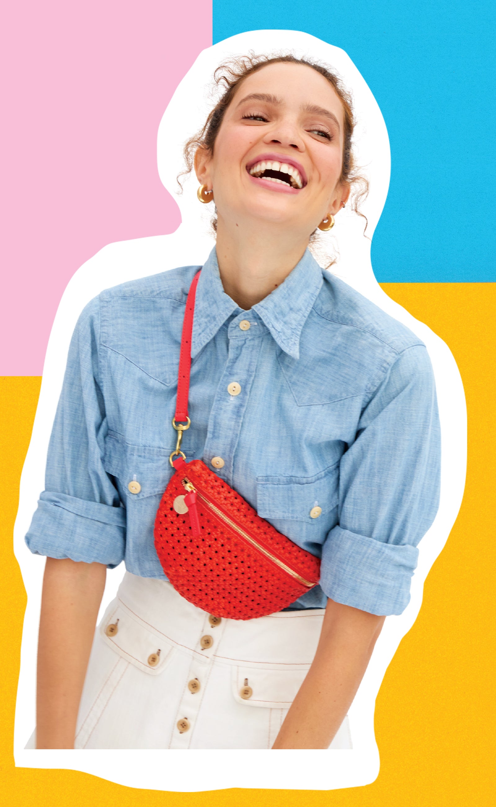 Model carrying the Bright Poppy Rattan Petit Fanny across her chest. 