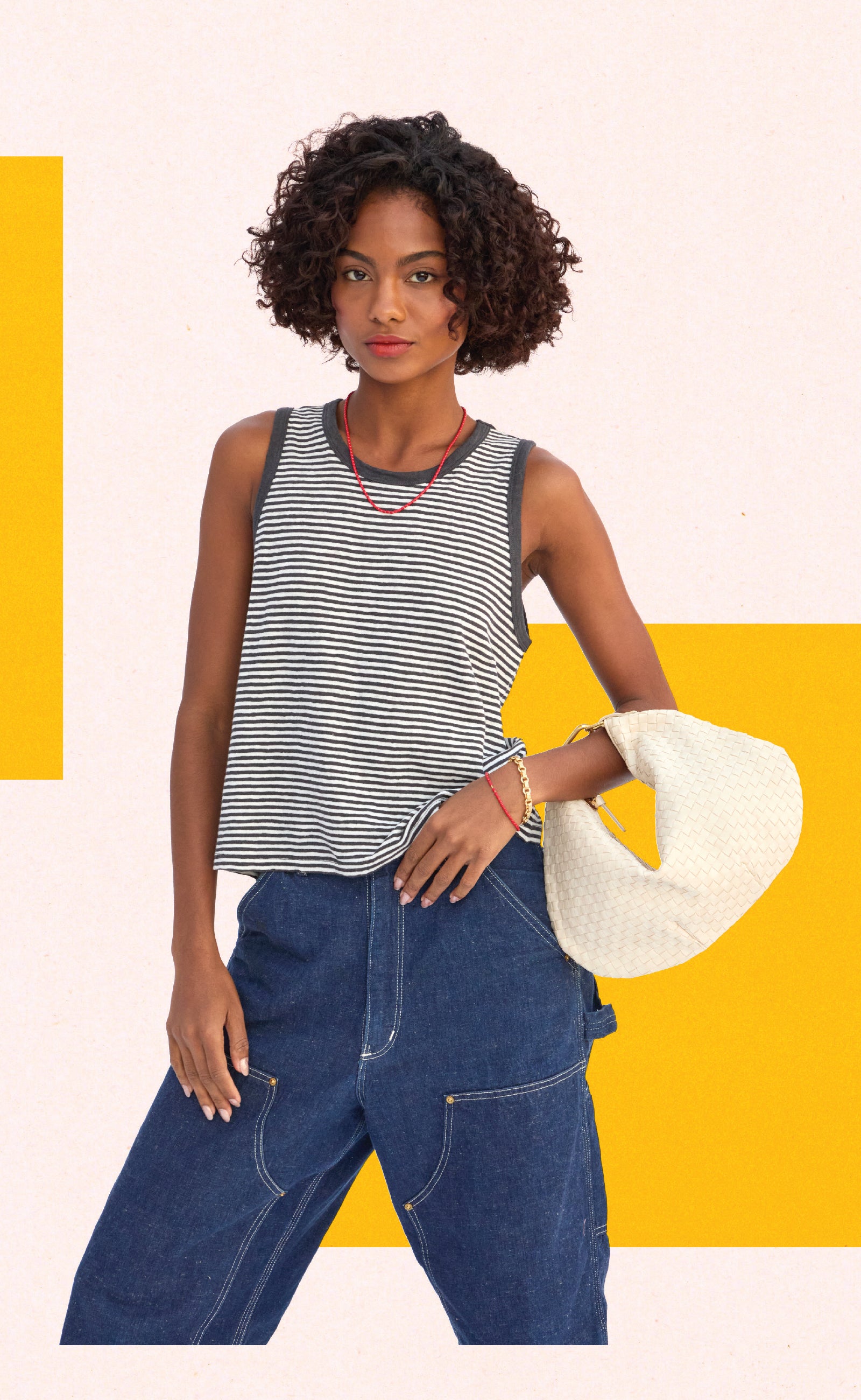 Moel holding the Cream Petit Moyen with Gold Top Handle Bébé.