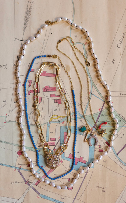 Assortment of Clare V. Fall necklaces.