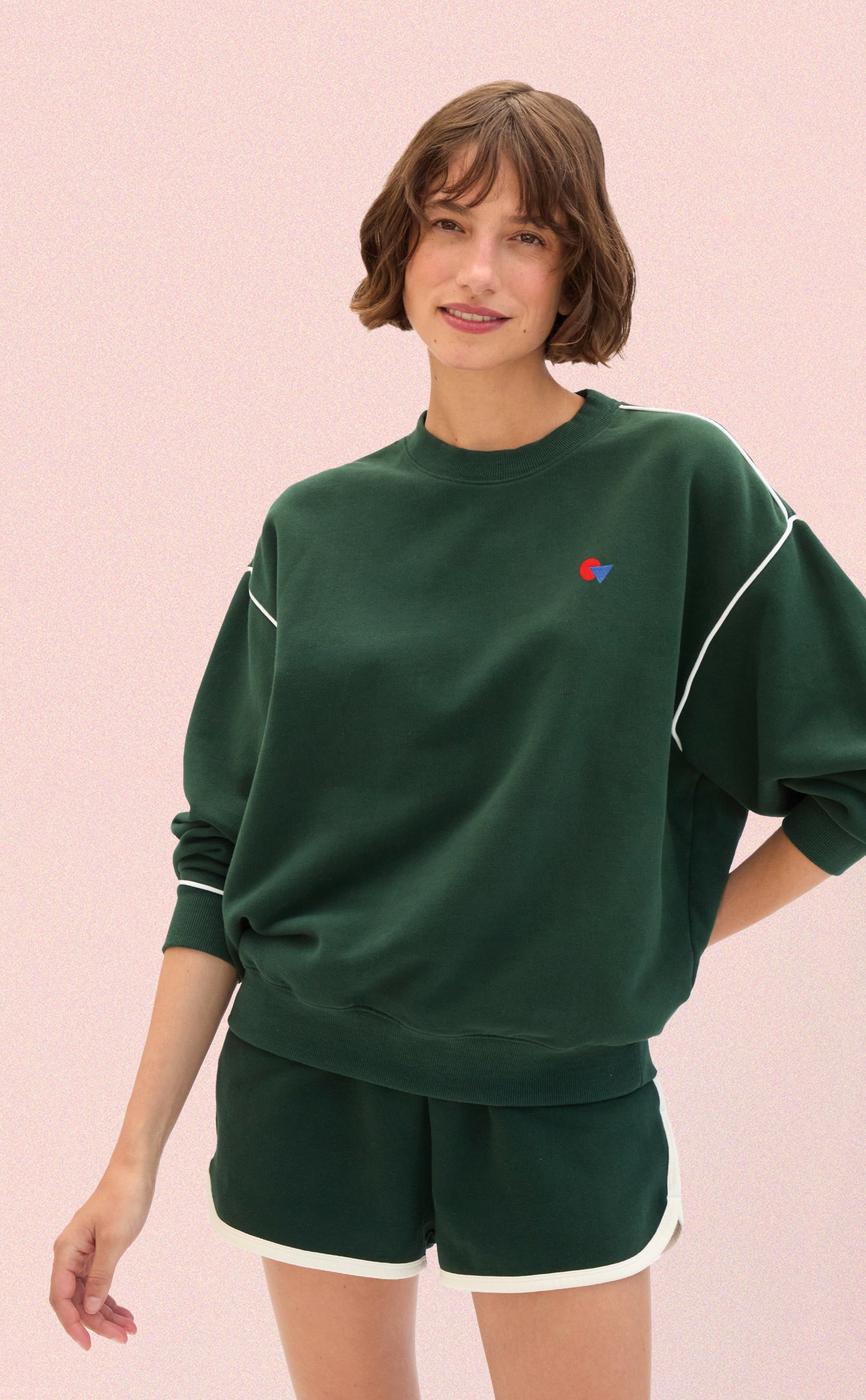 Model wearing the Deep Forest Oversized Sweatshirt with matching Le Jogging Short. 