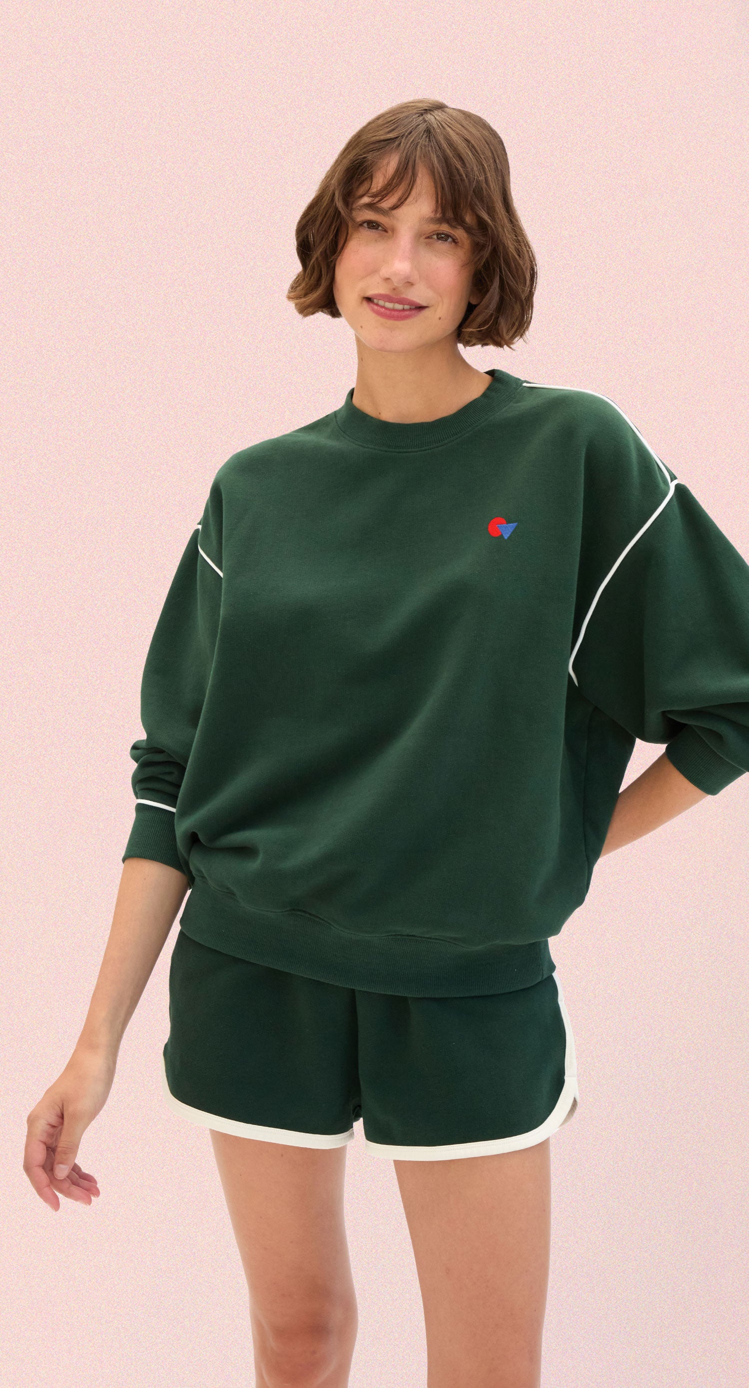 Model wearing the Deep Forest Oversized Sweatshirt with matching Le Jogging Short. 