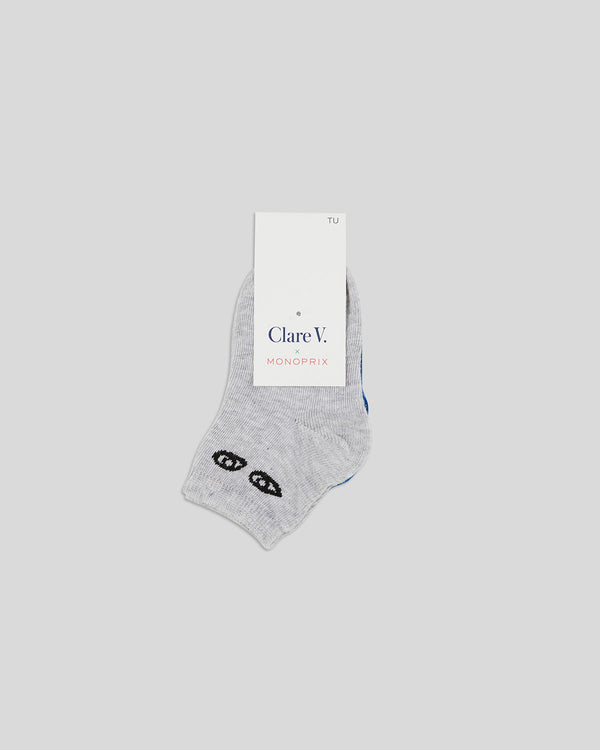 Image of the packaging for the Cobalt w/ Poppy Lips & Grey w/ Black Eyes Baby Sock 2 Pack