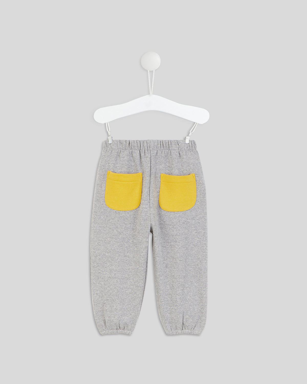 back image of the Grey with Marigold Pockets Baby Joggers, showing off the marigold pockets