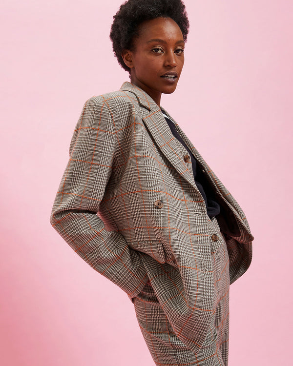 Model wearing the Grey Plaid w/ Orange Stitch Blazer with the matching pants