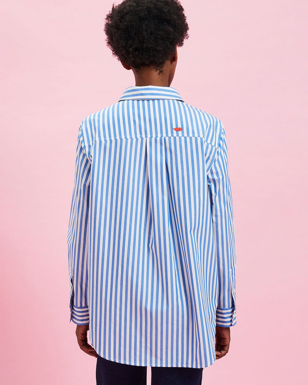 back view of the model wearing the Blue & Cream Stripes w/ Poppy Lips Button Up Shirt