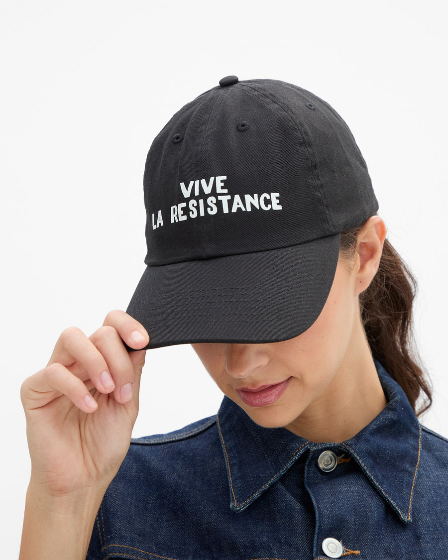 Marie wears the Vive La Resistance Baseball Cap