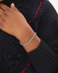 Candice wearing the Sterling Silver Box Chain Bracelet on her left wrist