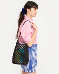 Danica carrying the Black Georgette on her shoulder