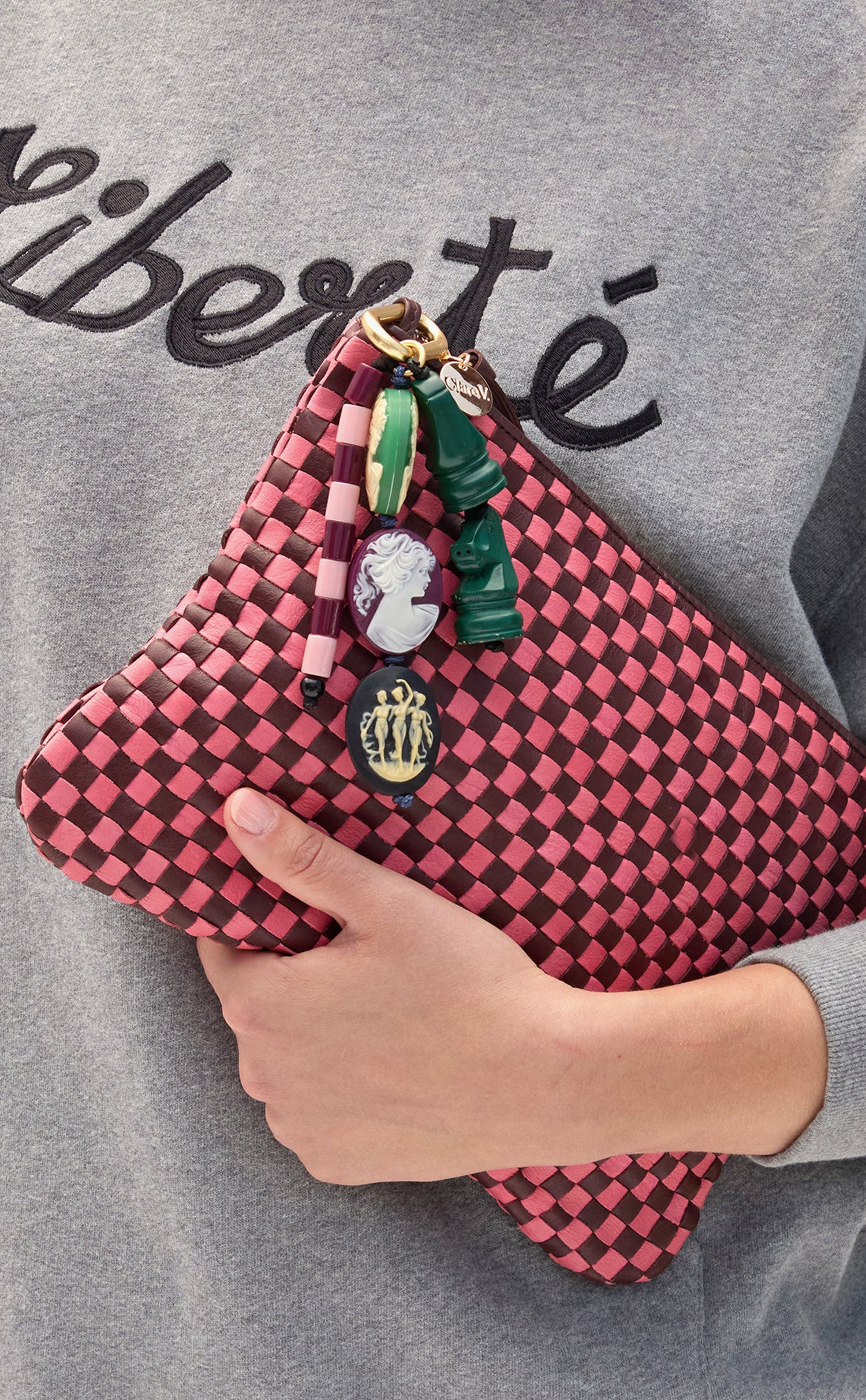 Flat Clutch with Bag Fob attached to it.