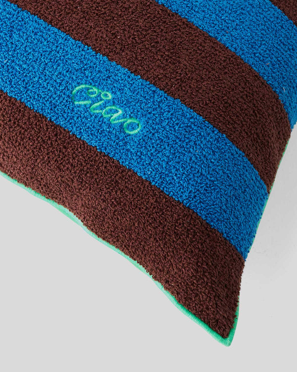 Close up of the ciao embroidery on the Navy & Brown Stripes w/ Green Ciao Coussin