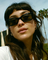 model wearing the Black Gothic Breeze Sunglasses from CRAP Eyewear