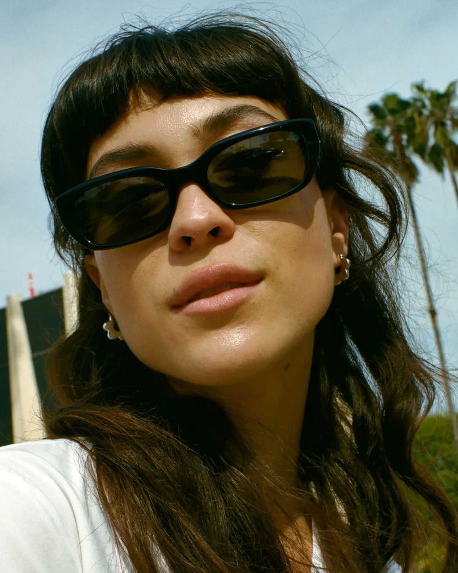 model wearing the Black Gothic Breeze Sunglasses from CRAP Eyewear