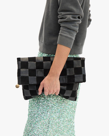 Model holding Carryall Clutch 