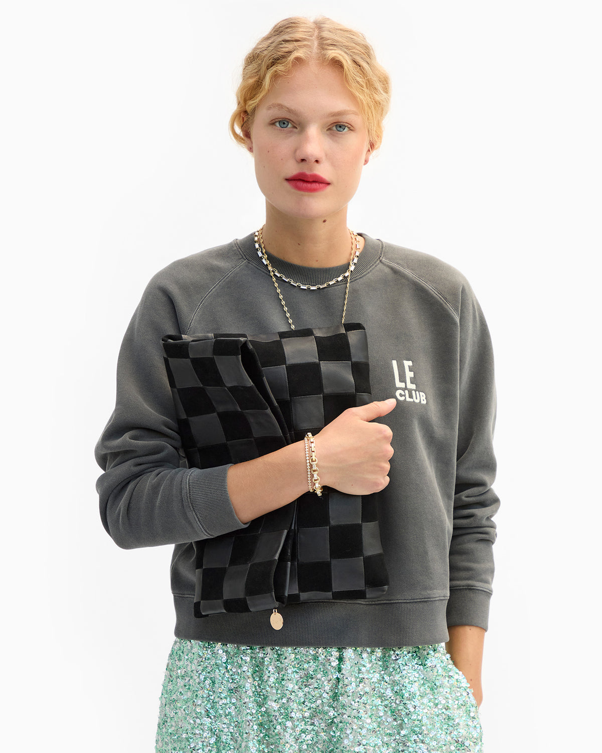 Carryall Clutch in model's arm