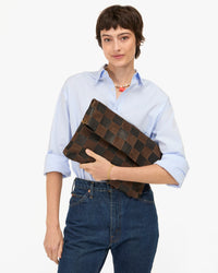 Nike holding Carryall Clutch